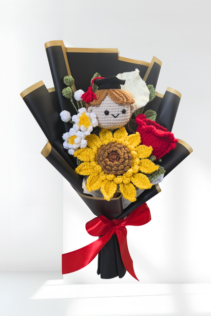 Graduation-themed bouquet with flowers and a small figure on a white background