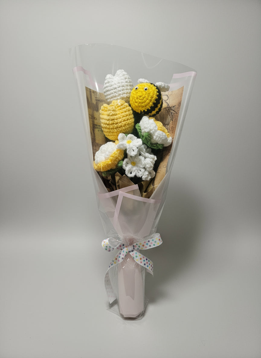Beautiful bouquet of crocheted flowers with a bee
