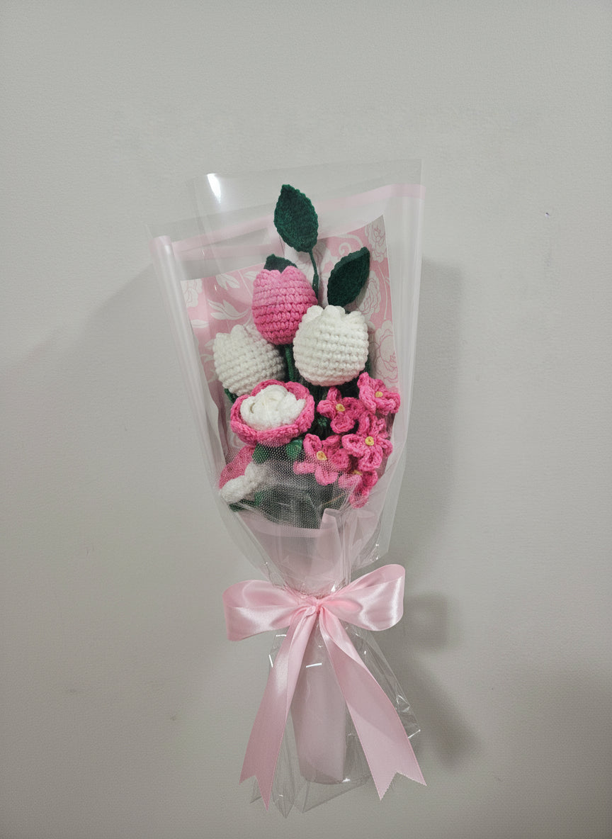 beautiful, handcrafted bouquet features a lovely combination of crocheted pink tulips and roses