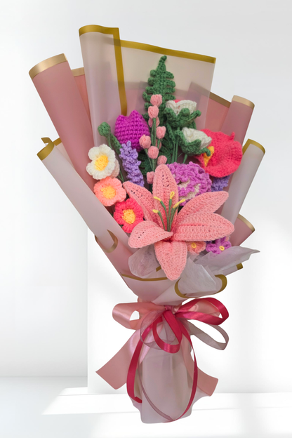 Knitted flower bouquet with pink and green colors on a white background