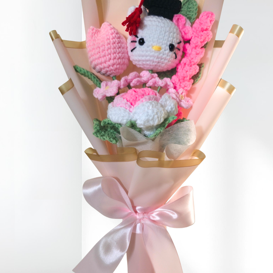 crochet graduation flower bouquet with a hello kitty figure