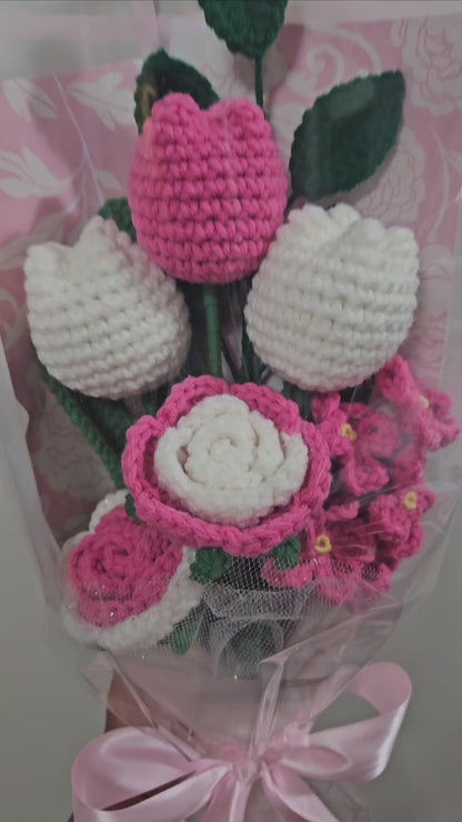 beautiful, handcrafted bouquet features a lovely combination of crocheted pink tulips and roses